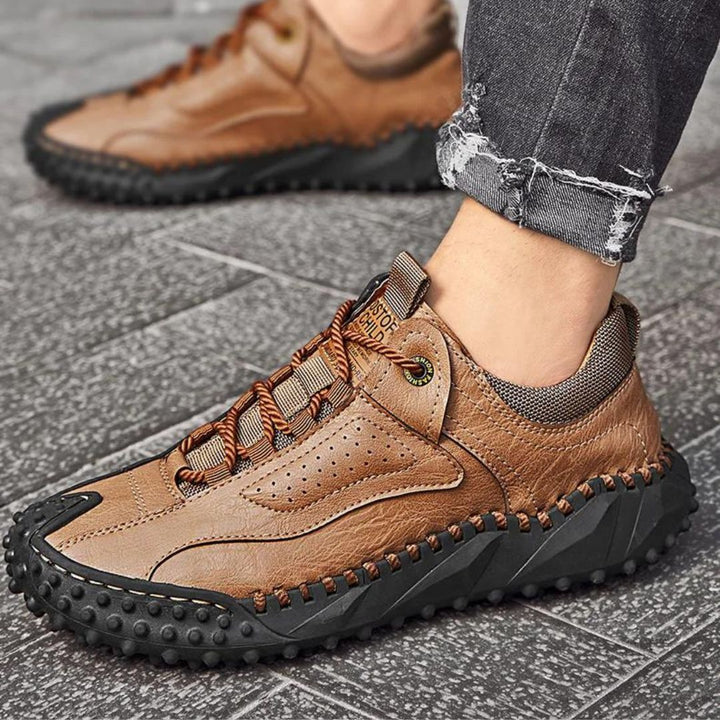 Robust outdoor lace-up shoes with studded tread