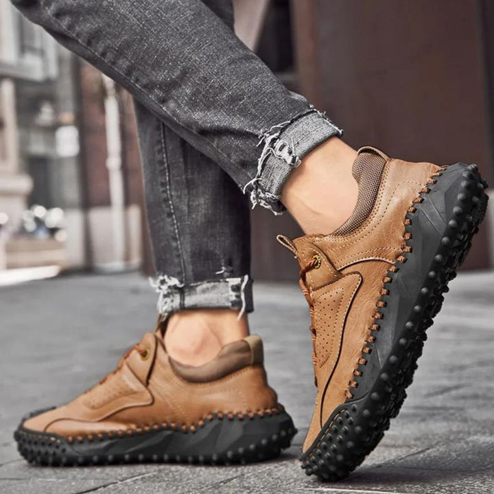Robust outdoor lace-up shoes with studded tread