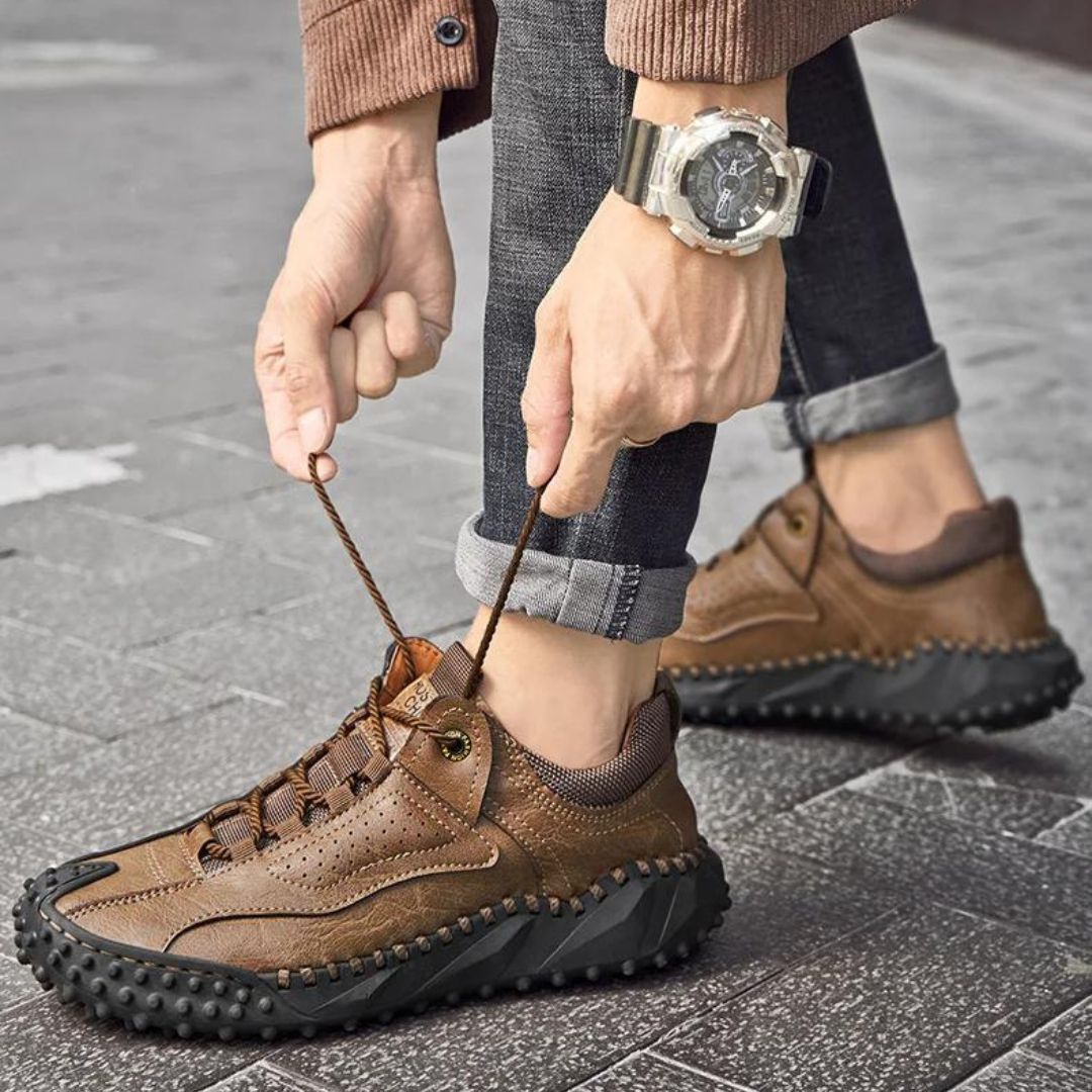 Robust outdoor lace-up shoes with studded tread