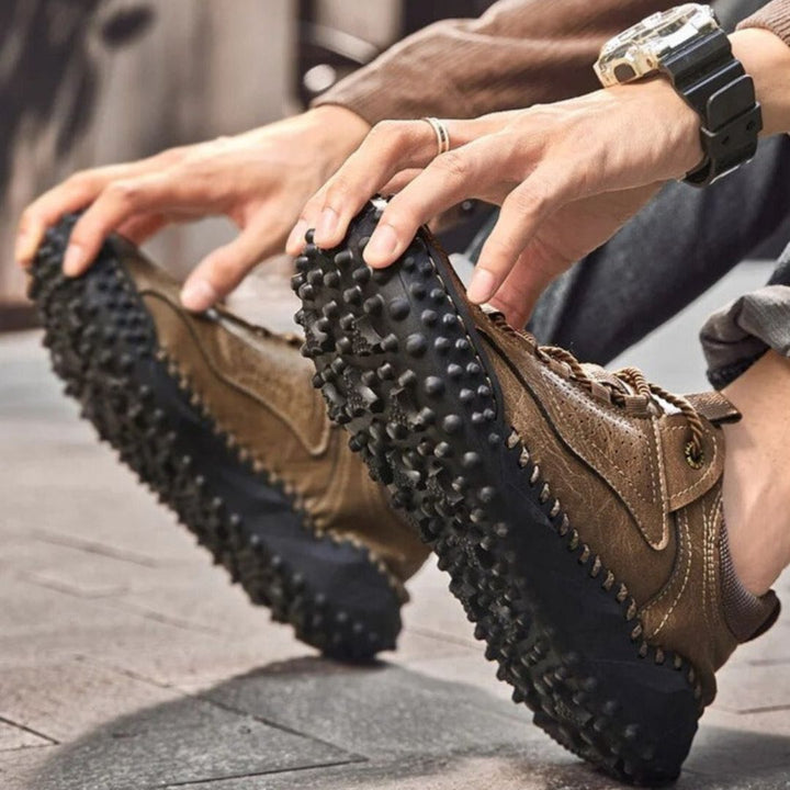 Robust outdoor lace-up shoes with studded tread