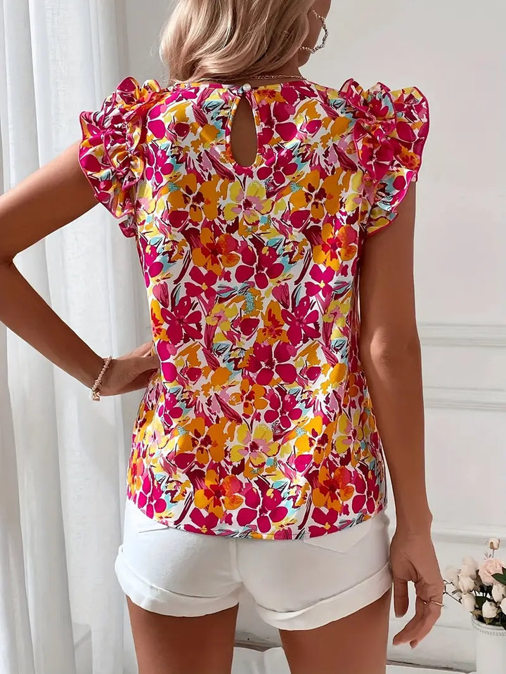 Chic Floral Print Blouse with Ruffled Details and Stylish Round Neckline