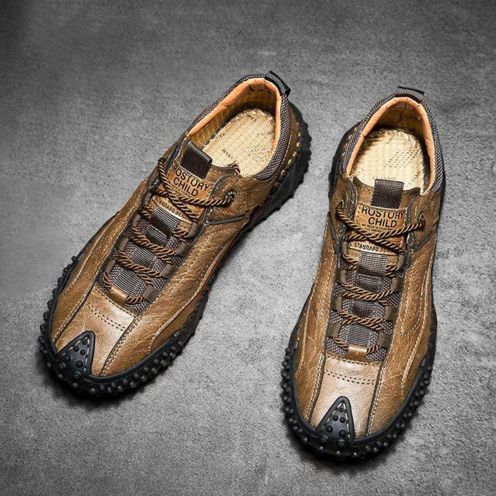 Robust outdoor lace-up shoes with studded tread