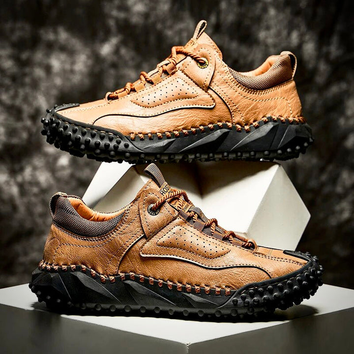 Robust outdoor lace-up shoes with studded tread