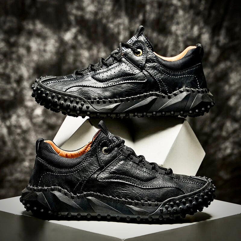 Robust outdoor lace-up shoes with studded tread