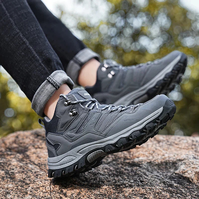 Waterproof trekking shoes with improved grip
