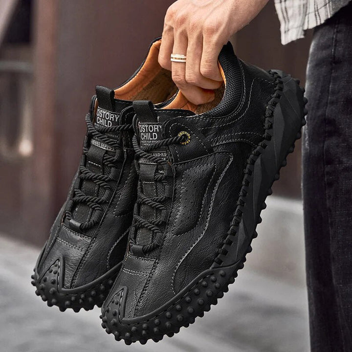 Robust outdoor lace-up shoes with studded tread