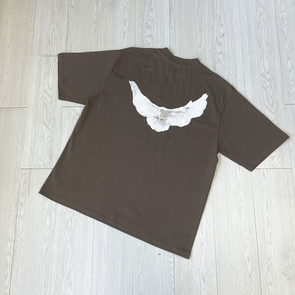 Retro-Inspired Loose Fit T-Shirt Featuring Charming Pigeon Design