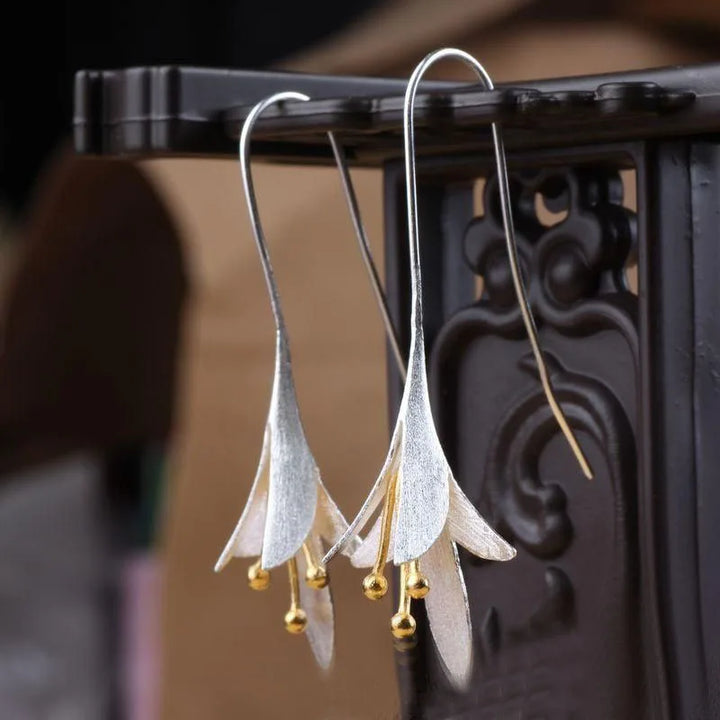 Flower dangle earrings with petal details